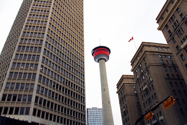 a-low-angle-shot-of-calgary-tower-between-city-buildings